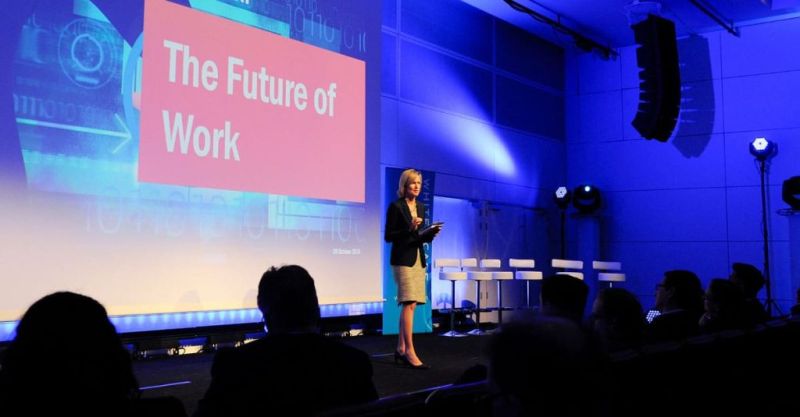 Image of woman speaker at conference to promote a conference