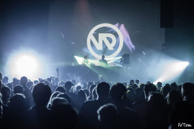 Quadrant + Iris performing live in front of a very large crowd